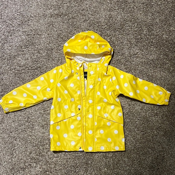 yellow polka dot rain jacket